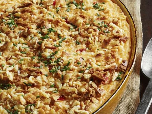 50. Maisbrei mit Käse und Pimentpaprika.