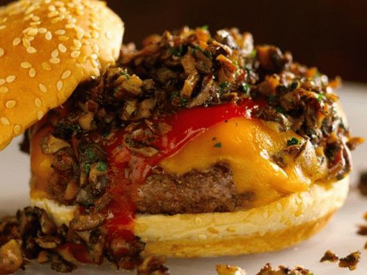 Photo Burger mit Pilzen und scharfem Ketchup