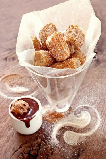 Foto von Churros mit Schokoladen Dip Sauce