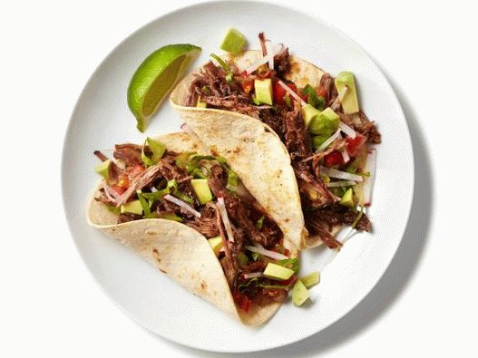 Photo Beef für Tacos, gedünstet mit grüner Salsa in einem Slow Cooker