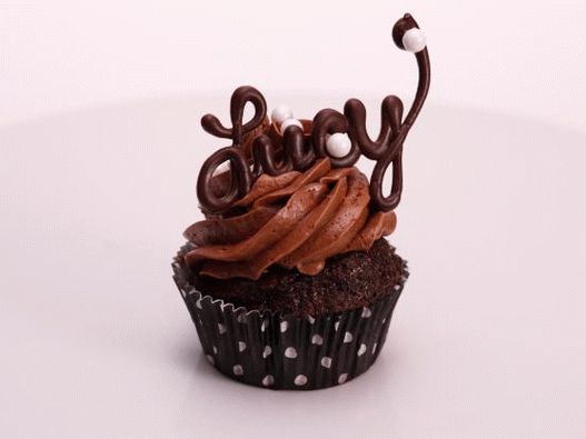 Photo Cupcake mit flüssiger Füllung und Schokoladencreme
