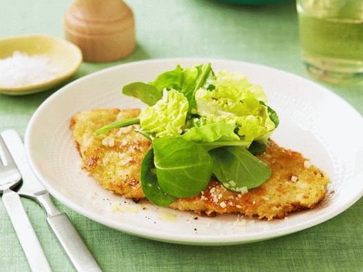 Foto Hühnerkoteletts unter einer Parmesankruste Foto Hühnerkoteletts unter einer Parmesankruste