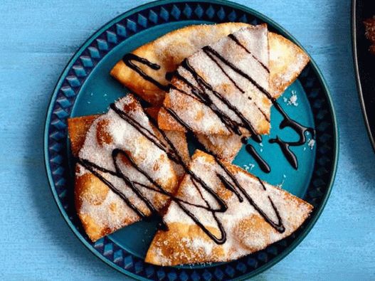 Sopapiyas mit Schokoladensauce