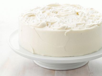 Foto von Mandelkuchen mit weißer Schokoladenglasur