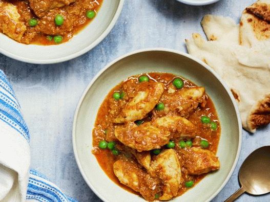 Photo Spicy Curry mit Erbsen und Hähnchen