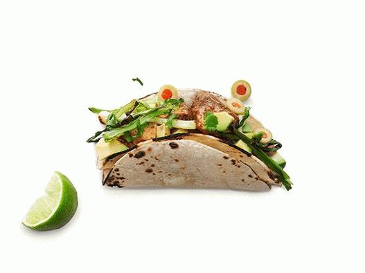 Foto von Tacos mit Fisch Mahi-Mahi (Corifen) und Zitrusfrüchten