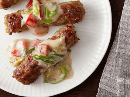 Foto Bratwürste mit Milchsauce